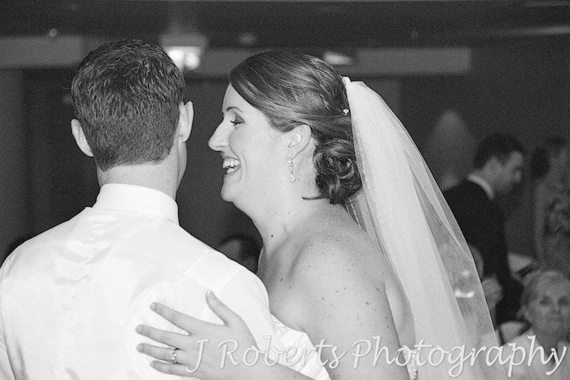 Bride laughing during bridal waltz - wedding photography sydney